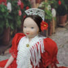 small spanish porcelain doll